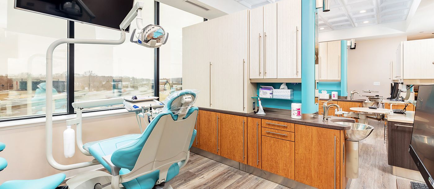 Operatory with floor-to-ceiling windows at Aesthetic Smile Reconstruction in Waltham, MA
